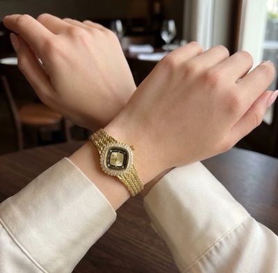 Montre fine en acier inoxydable doré et cadrant ovale