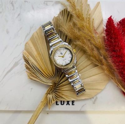 Montre bicolores or et argent avec strass