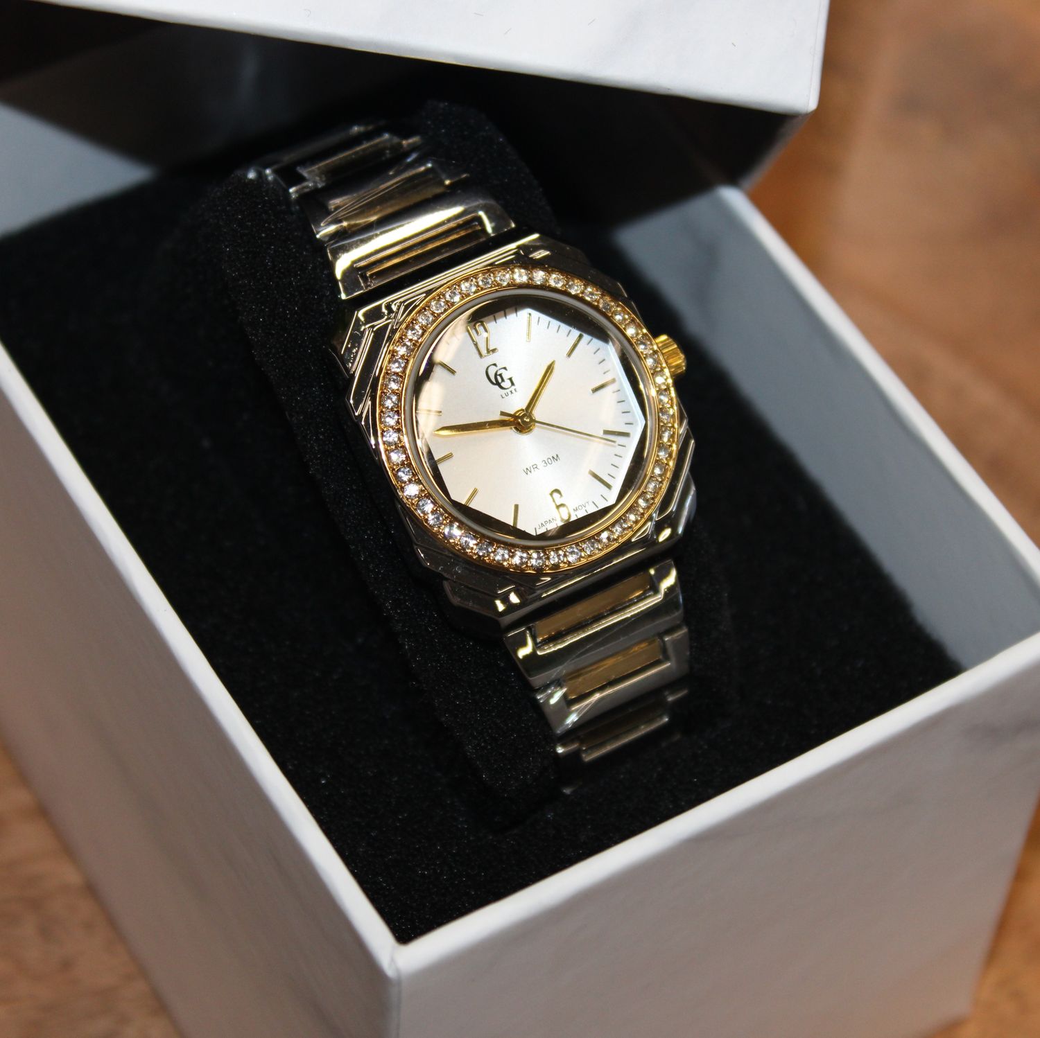 Montre bicolores or et argent avec strass