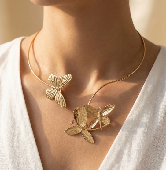 Collier rigide en acier avec papillons - Or