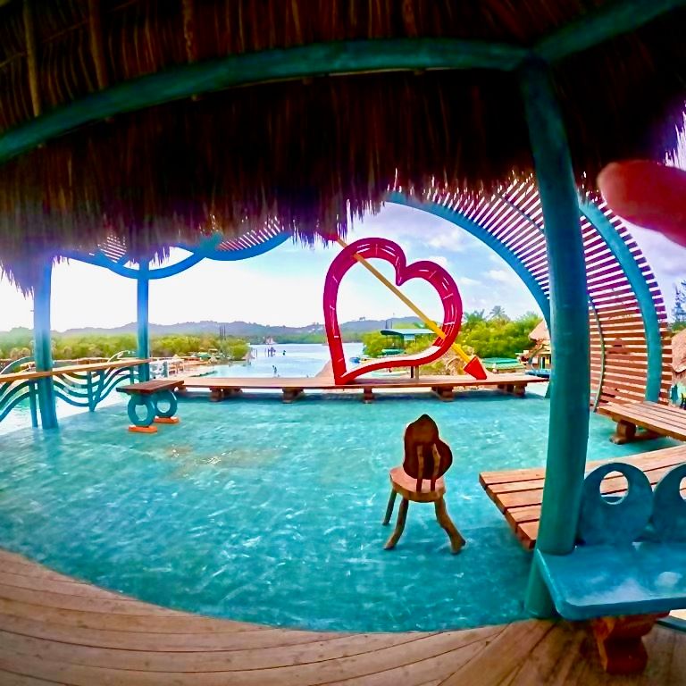 Island Escape =>>> Includes entry to private island, water shuttle, beach access, lounge chair, dive platform, animals, hammocks, cafe & bar with music!