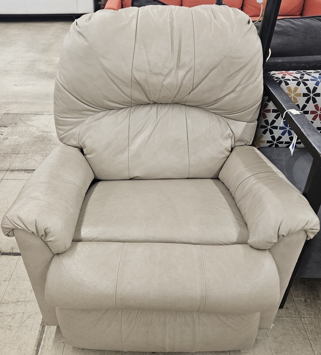 "Serenity in Leather: Beige Recliner Chair for Ultimate Comfort"