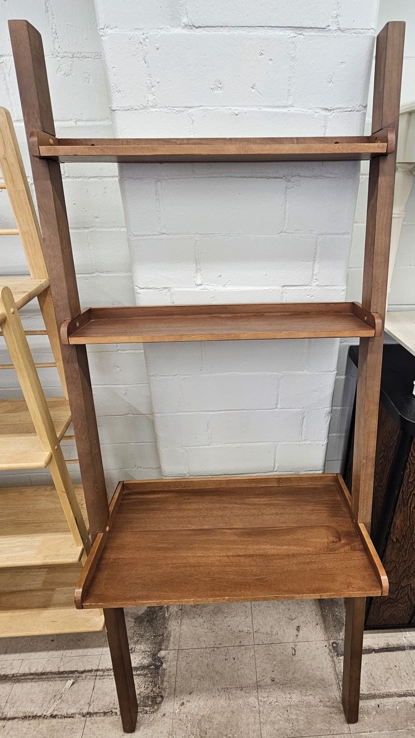 Leaning wooden ladder bookshelf