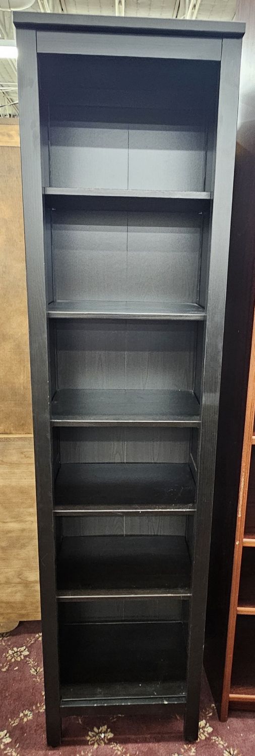 Sleek and modern tall, skinny black bookcase
