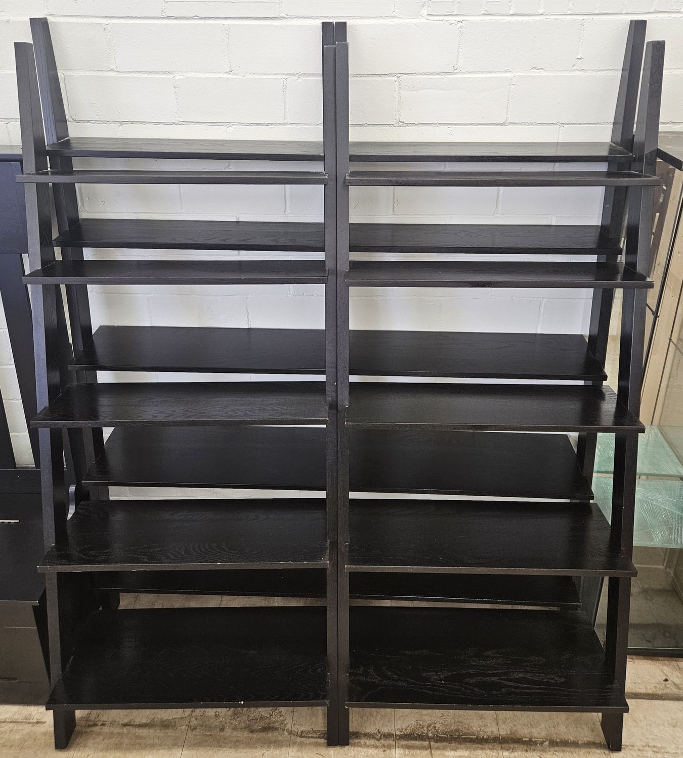 Tall black wooden leaning ladder shelf