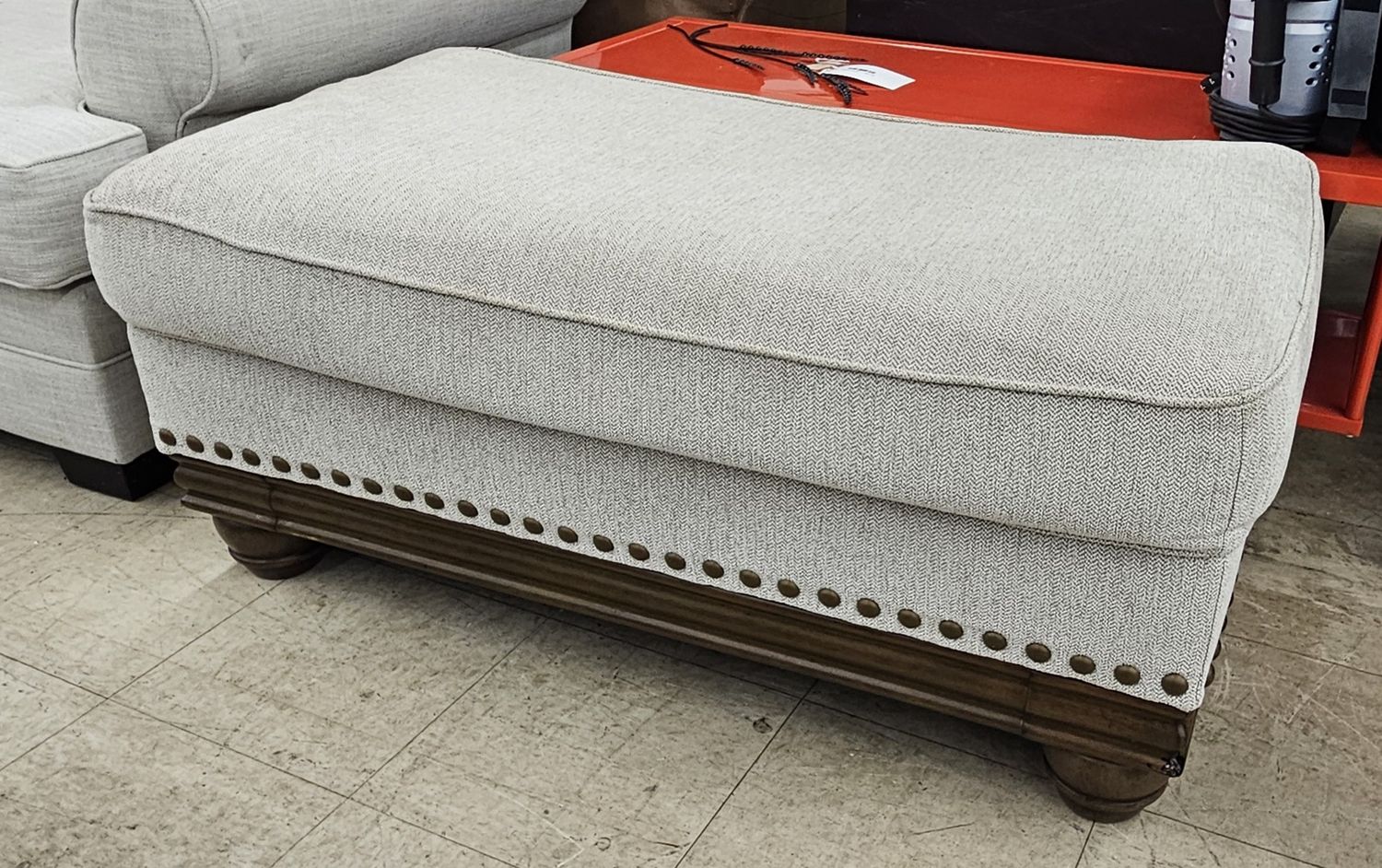 Elegant white fabric ottoman