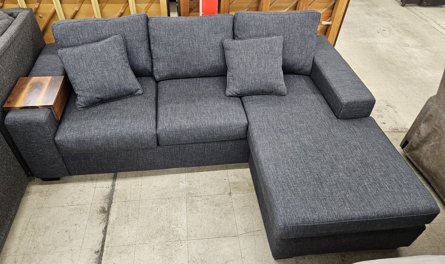 Charcoal grey L-shaped couch