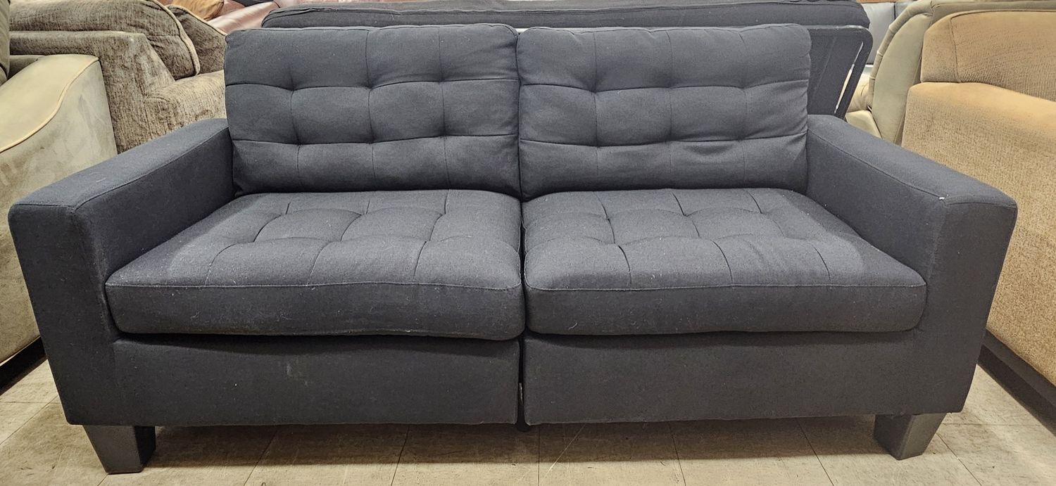 Black upholstered sofa couch