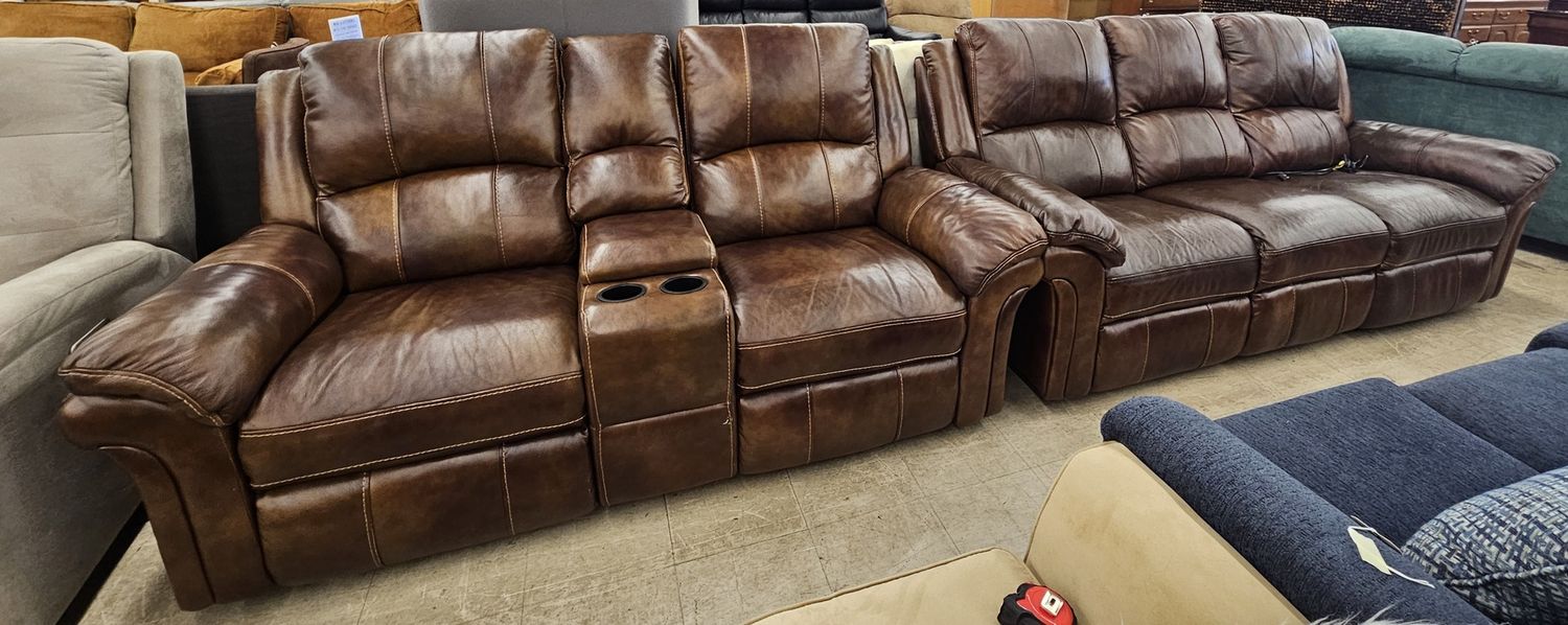 Brown leather power reclining couch and loveseat set