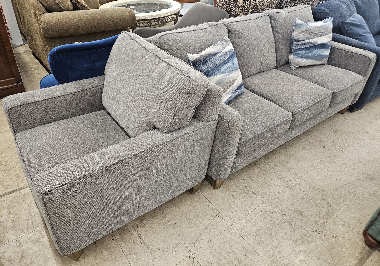 Stunning grey fabric couch and matching chair set