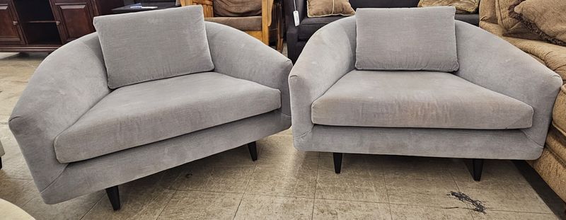 Oversized modern chairs in grey fabric