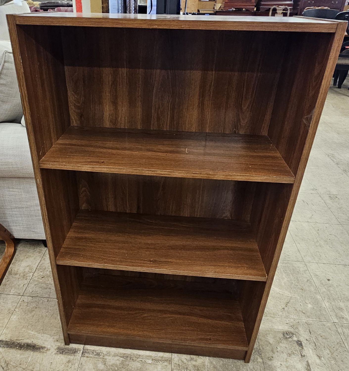 Dark brown three-tier bookshelf