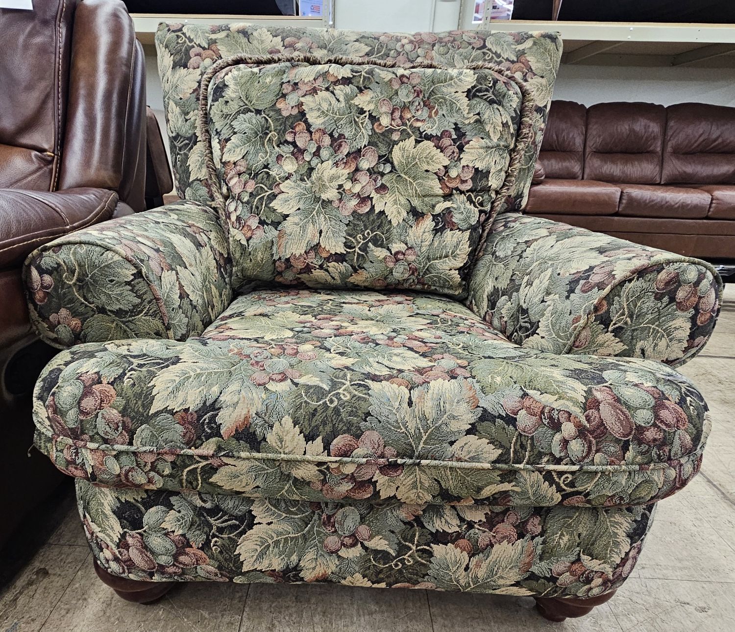 Delightful green fruit upholstered armchair