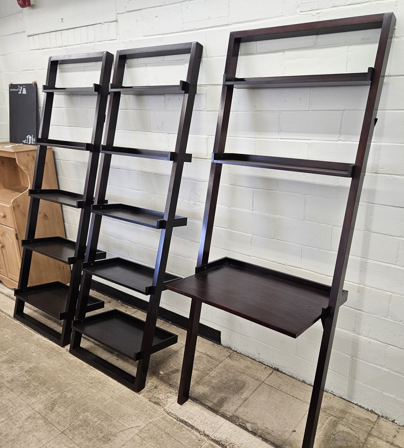 Set of three dark brown ladder shelves
