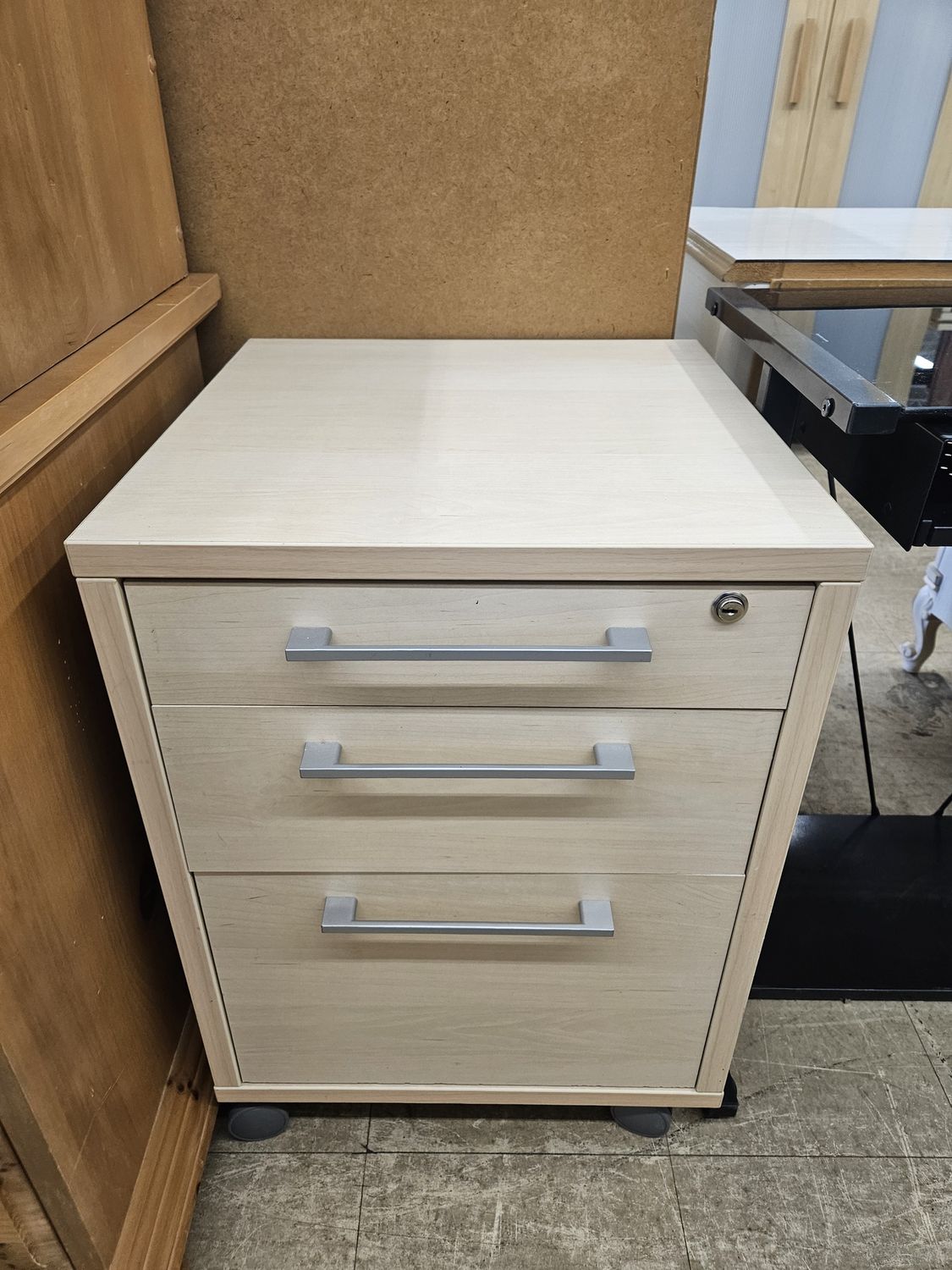 Wood filing cabinet.