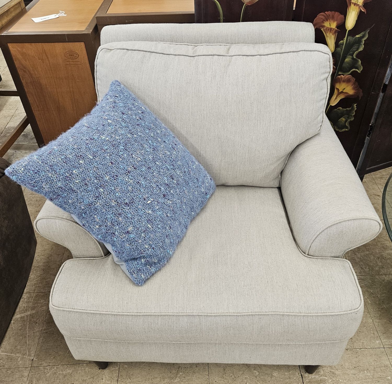 Oversized, modern light grey armchair