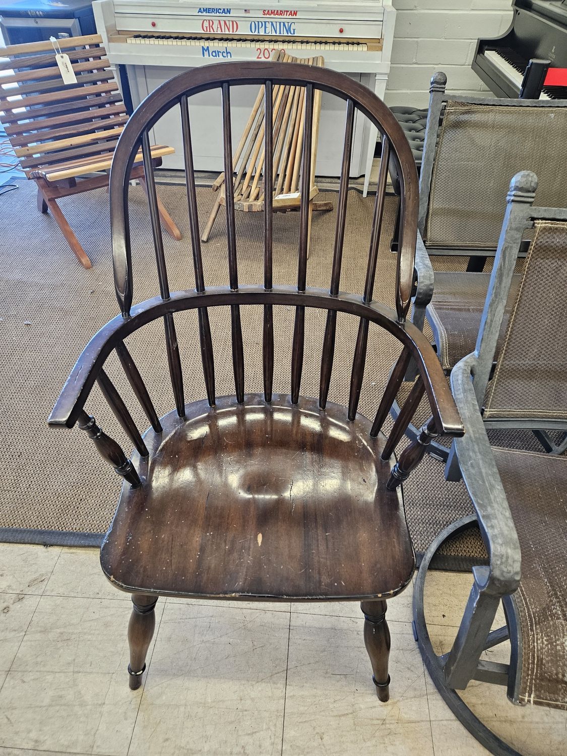 Brown wooden hoop back armchair