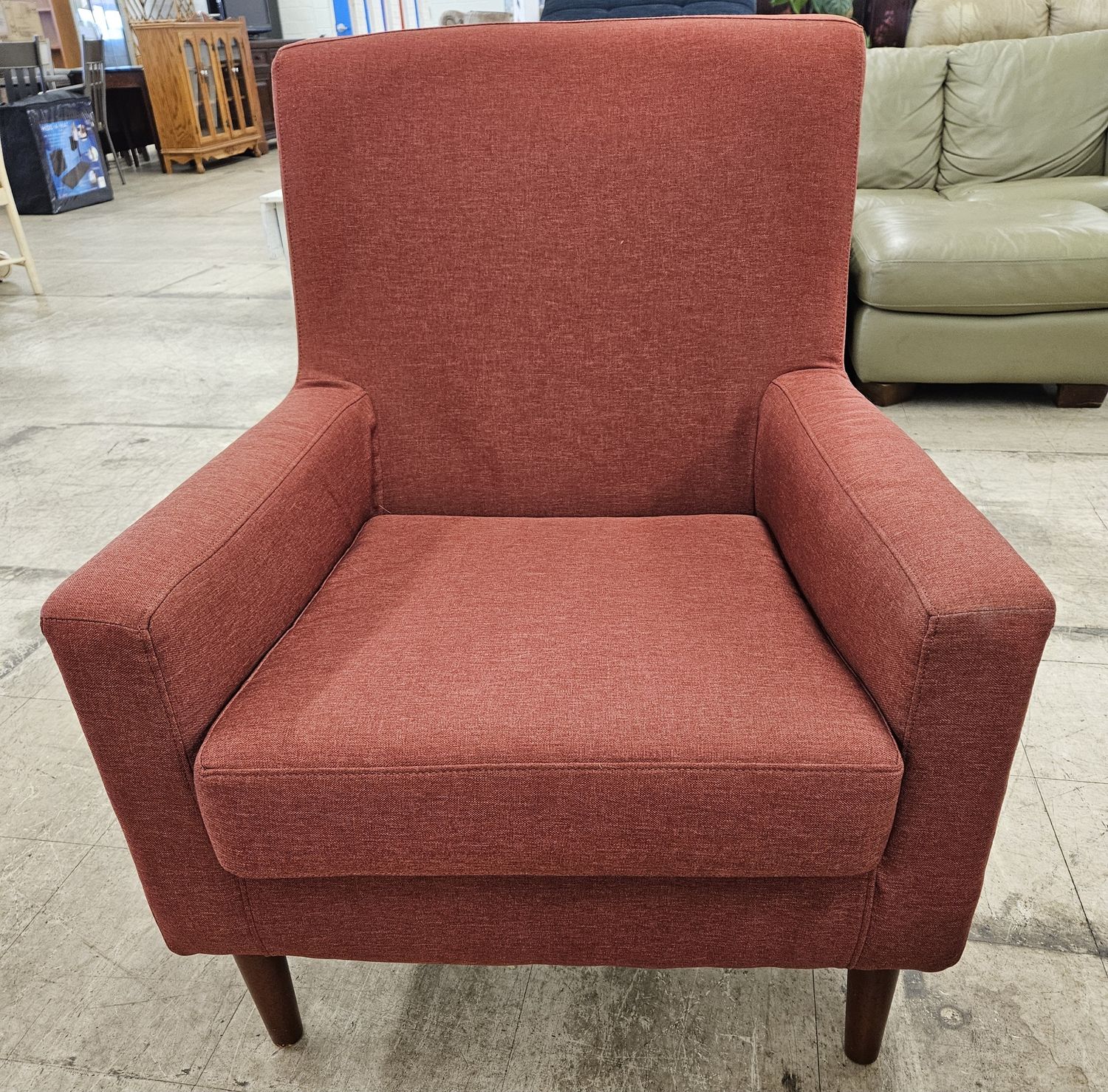 Modern red upholstered armchair