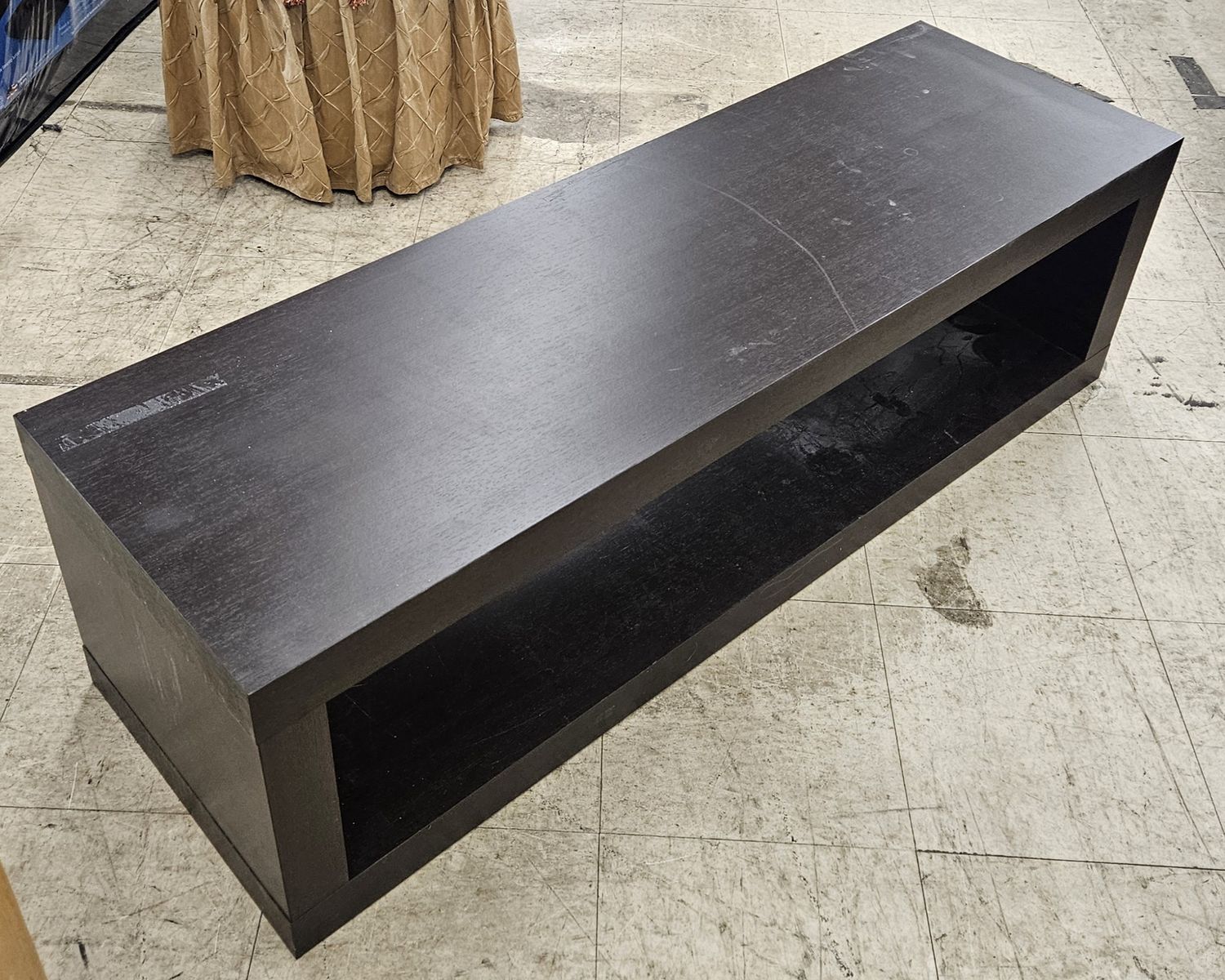 Sleek black wooden coffee table