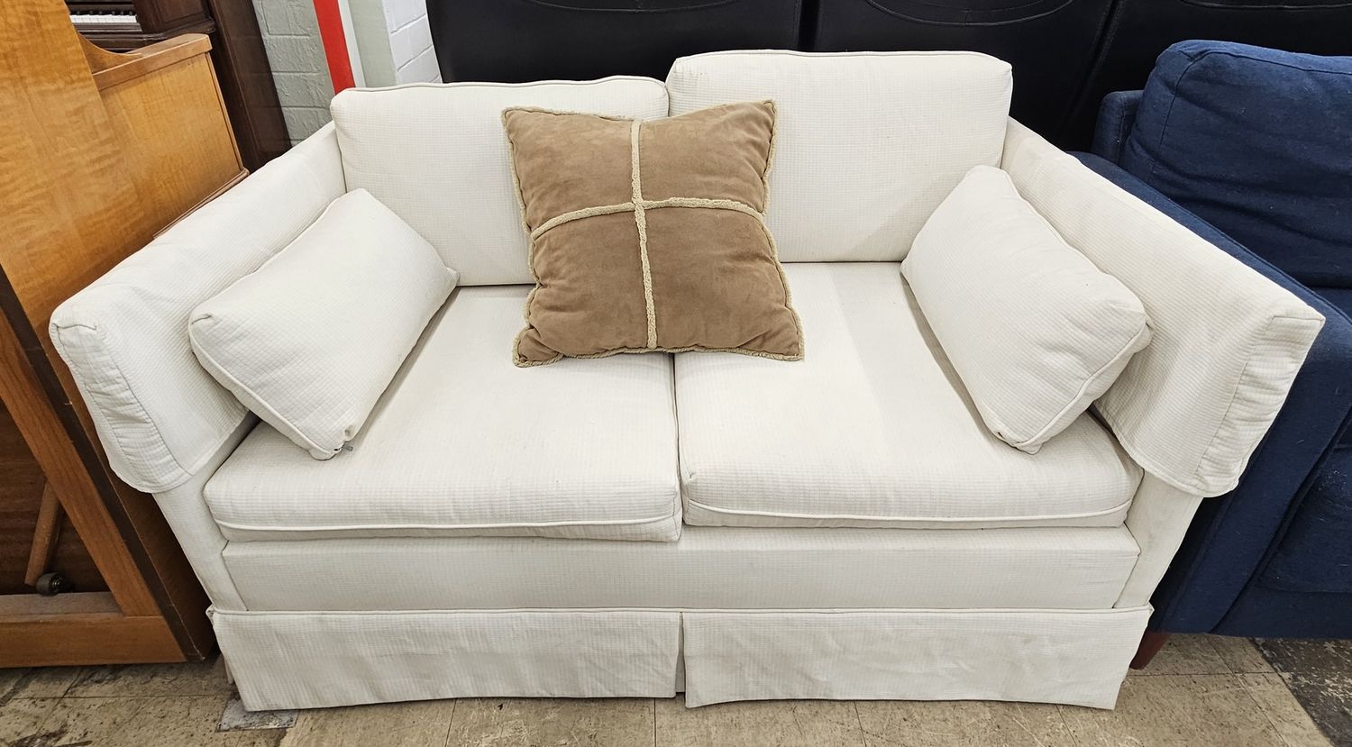 White Slipcovered Loveseat