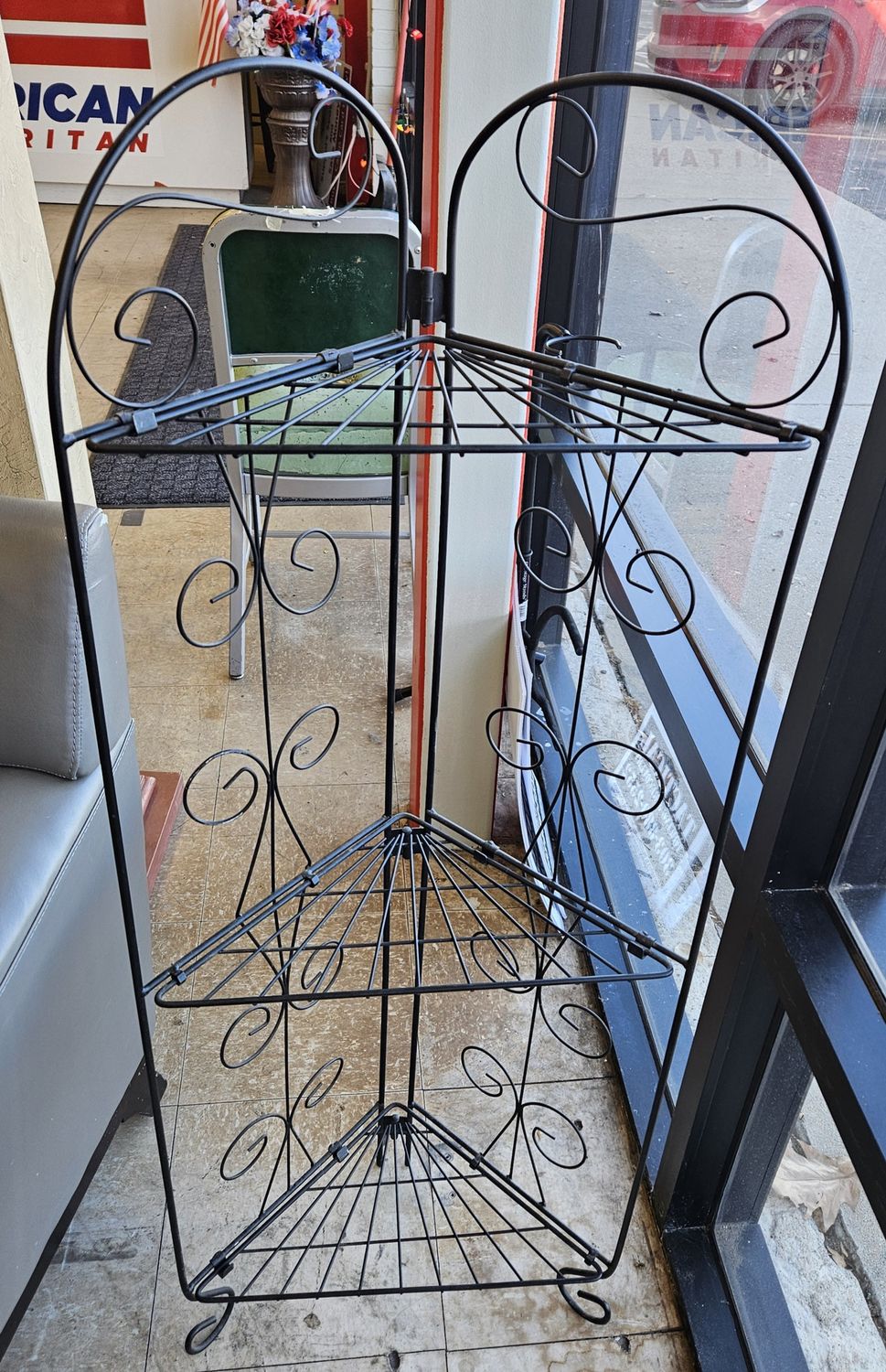 4-tier black metal corner shelf