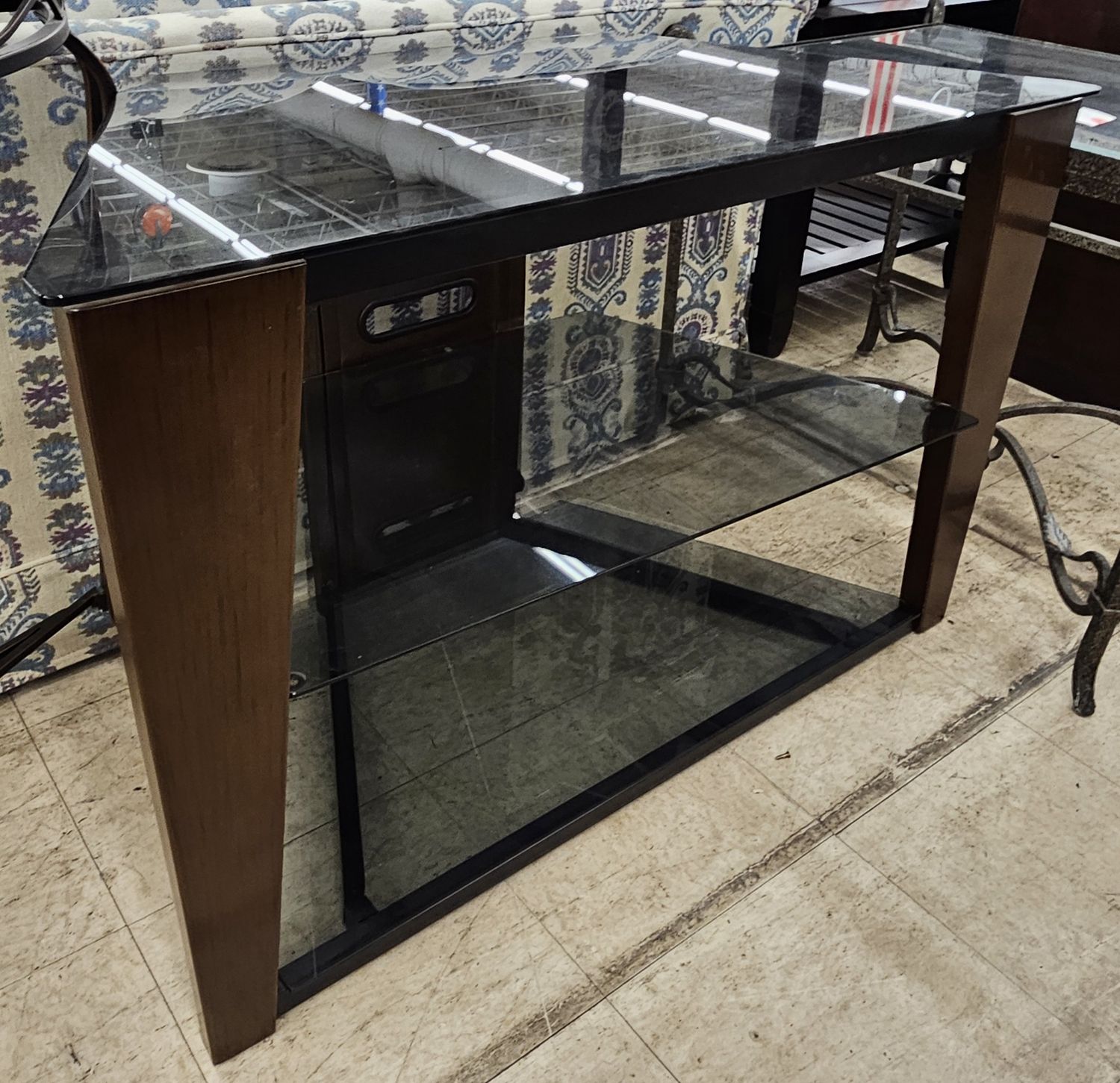 Dark wood and glass TV stand