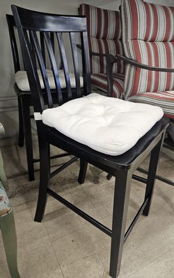 Pair of black wooden bar stools