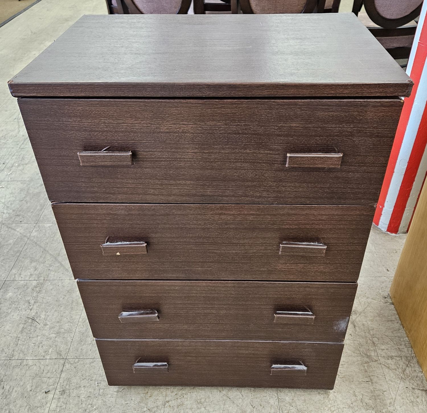 Dark brown wooden chest of drawers