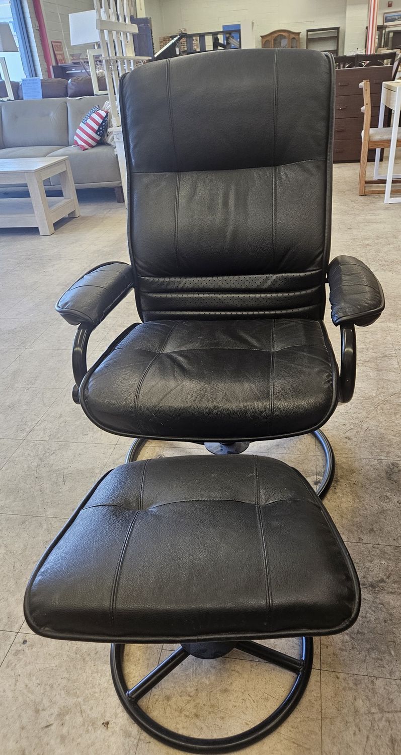 Black leather recliner chair and ottoman