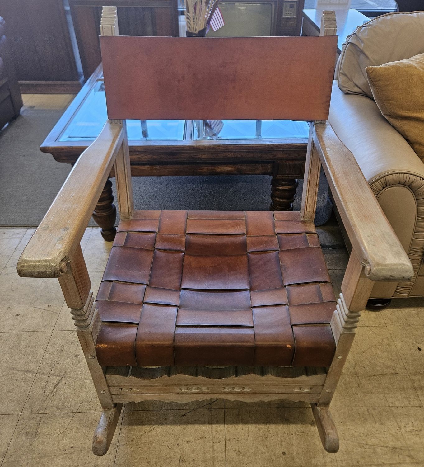 Leather-strapped rocking chair