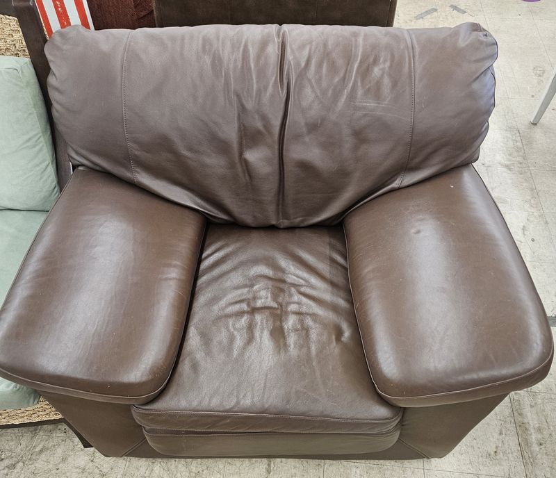 Brown leather armchair