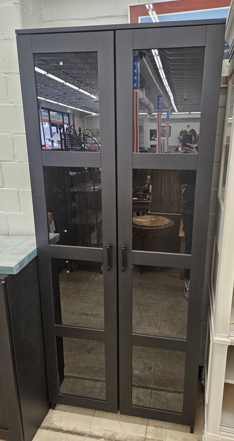 Black IKEA BRIMNES glass-door cabinet