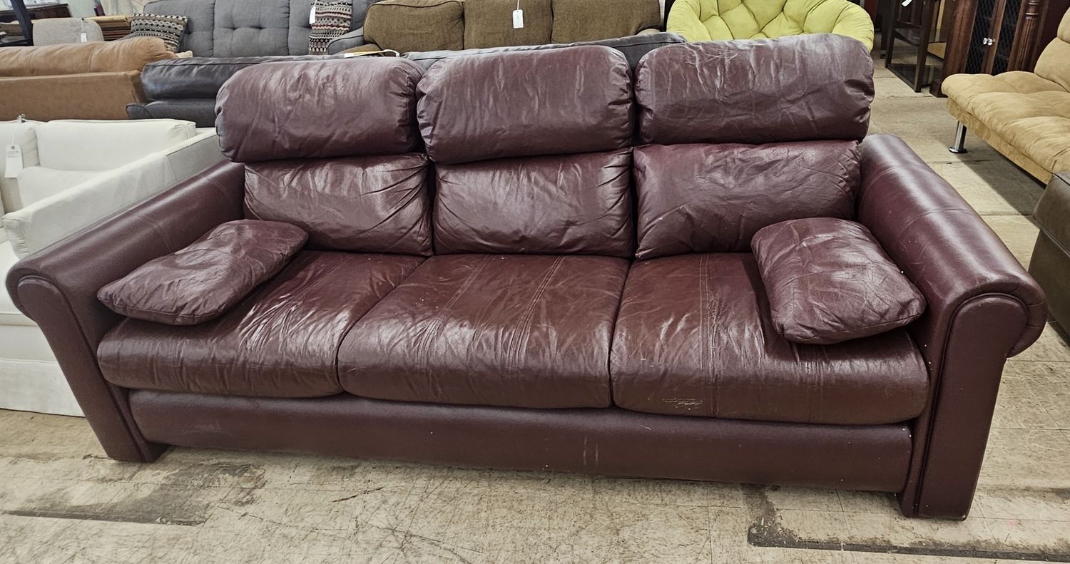 Maroon leather sofa