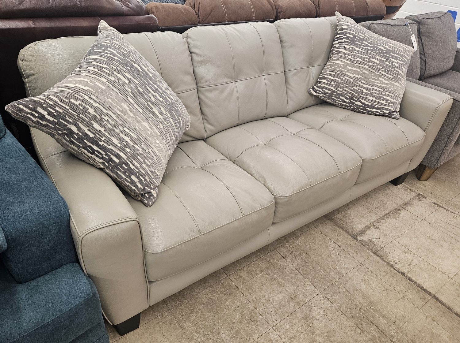 Taupe Leather Loveseat