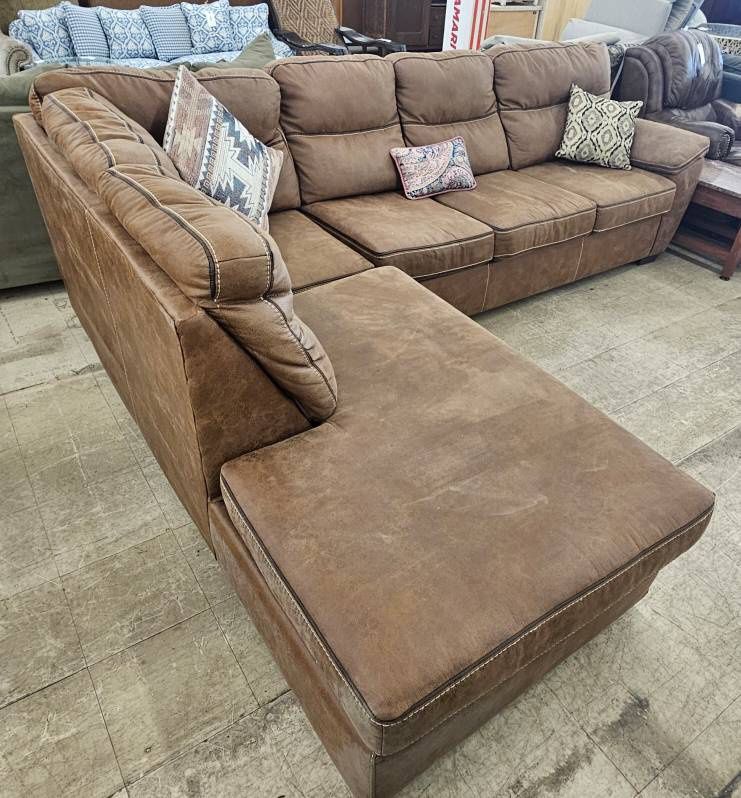 Brown, L-shaped sectional sofa