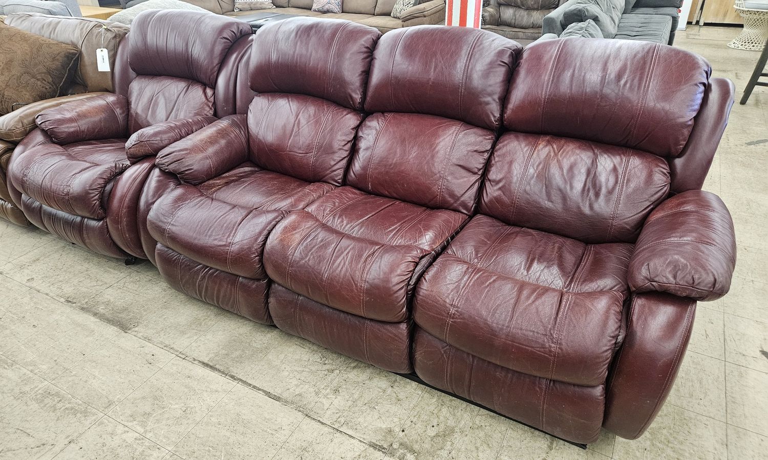 Plush, cherry-brown leather couch and chair combo