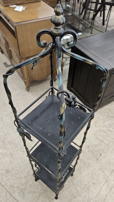 Dark metal plant stand