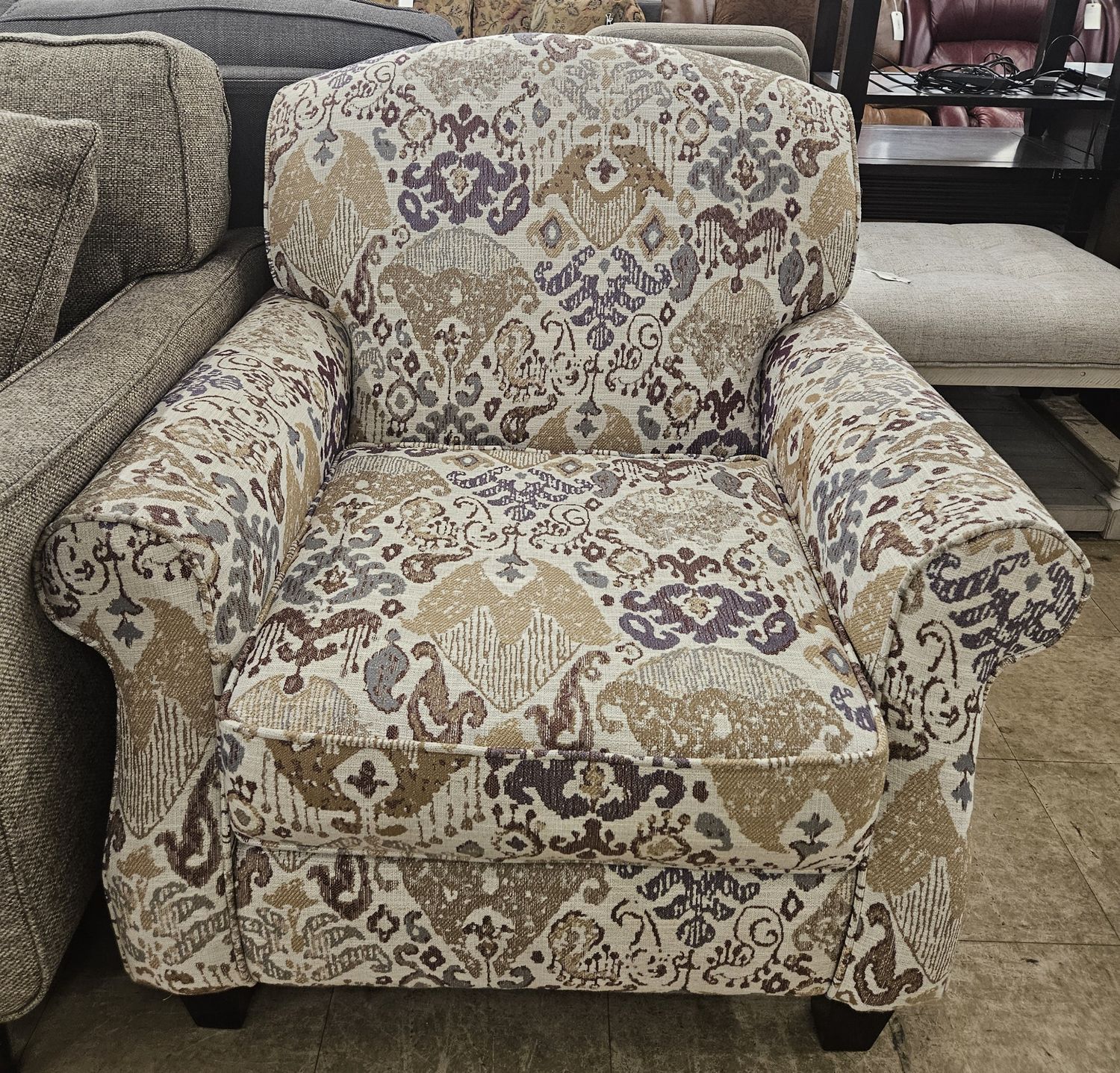 Upholstered armchair