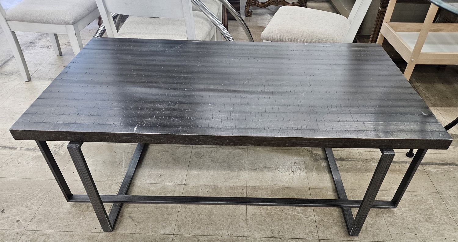 dark-stained wood top coffee table
