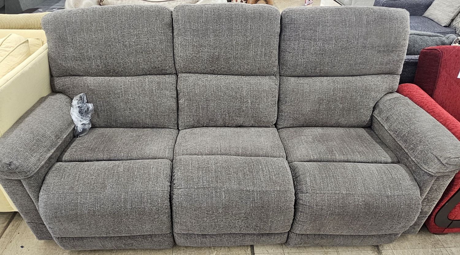Plush three-seater power recliner sofa