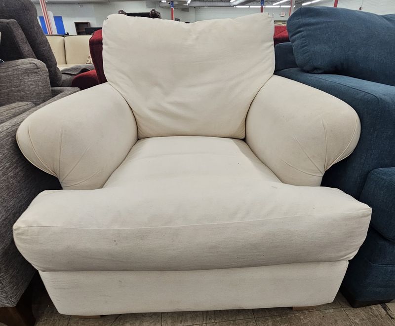 Oversized, cloud-like armchair.