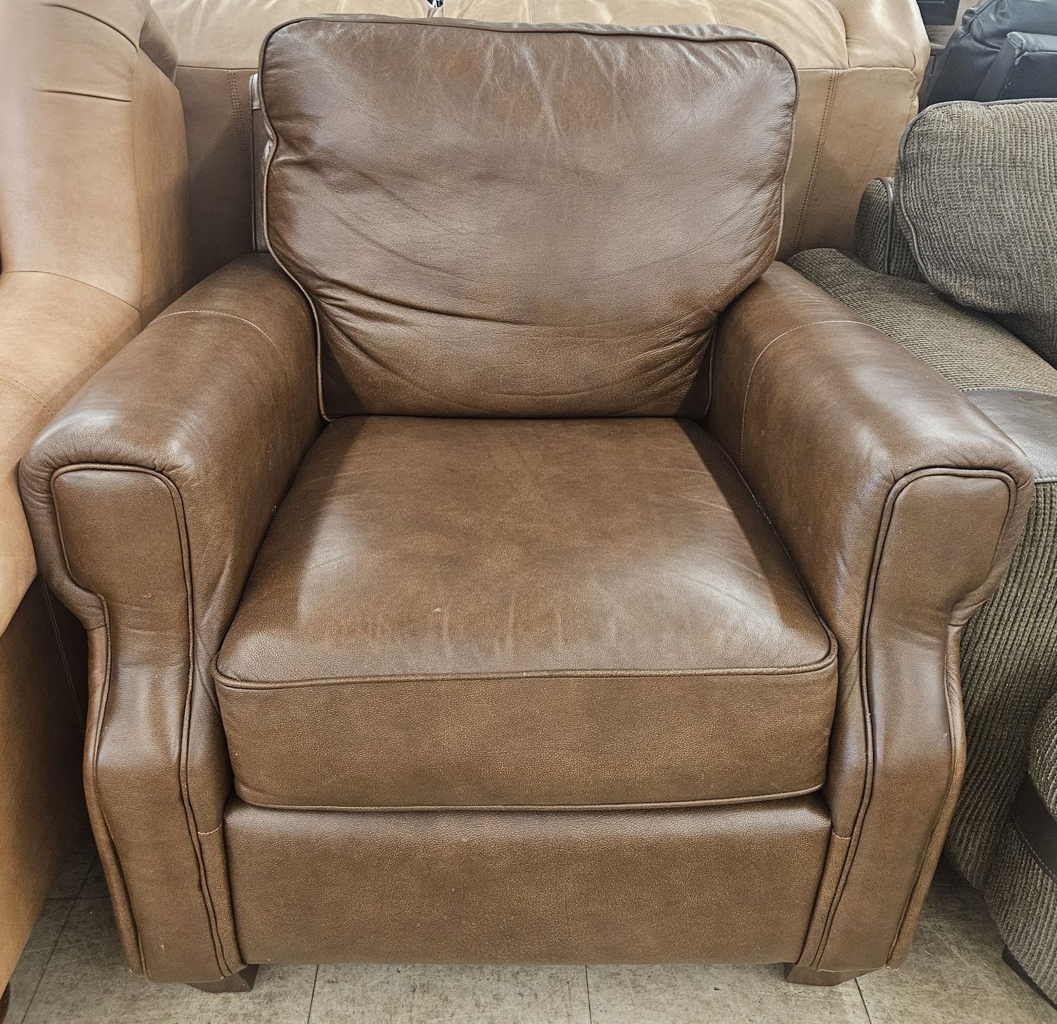 Brown Leather Armchair..