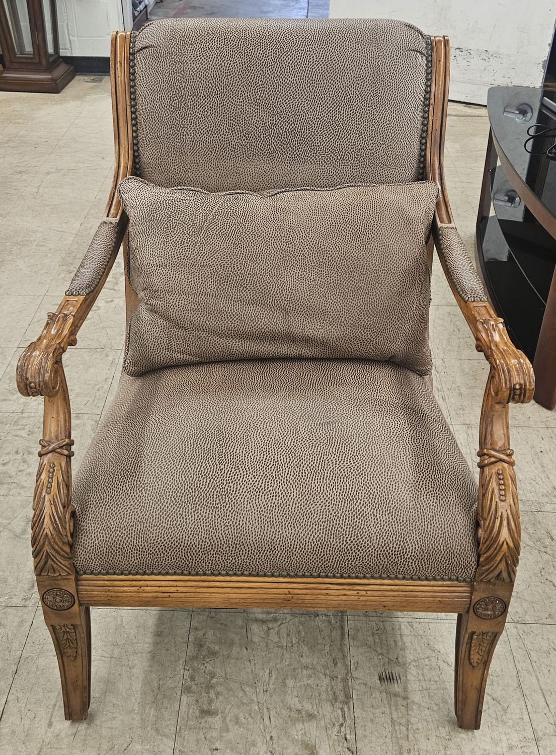 Carved wood accent chair