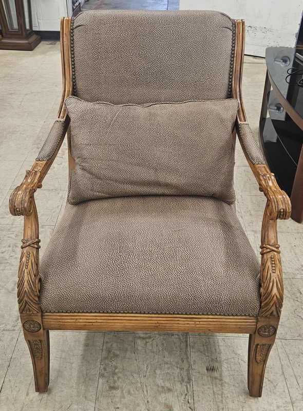 Carved wood accent chair