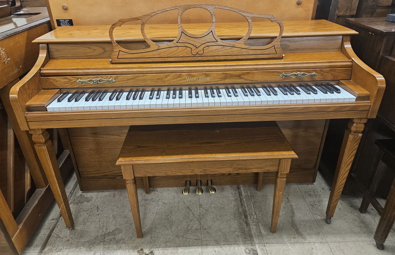 Wurlitzer console Piano.