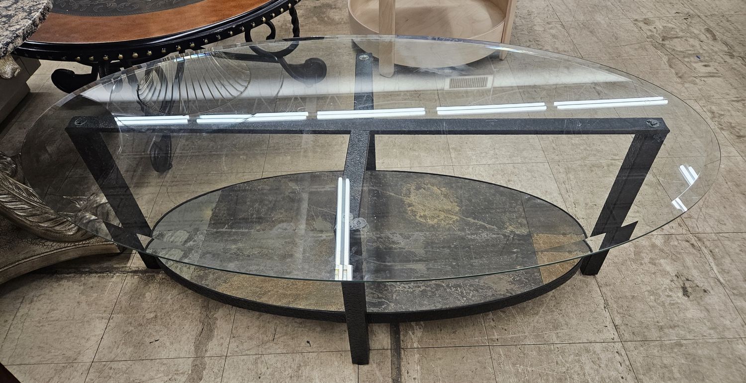 Oval glass coffee table..