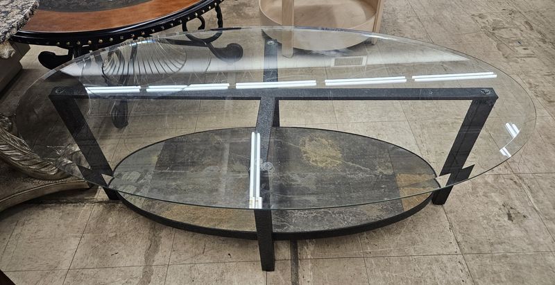 Oval glass coffee table..