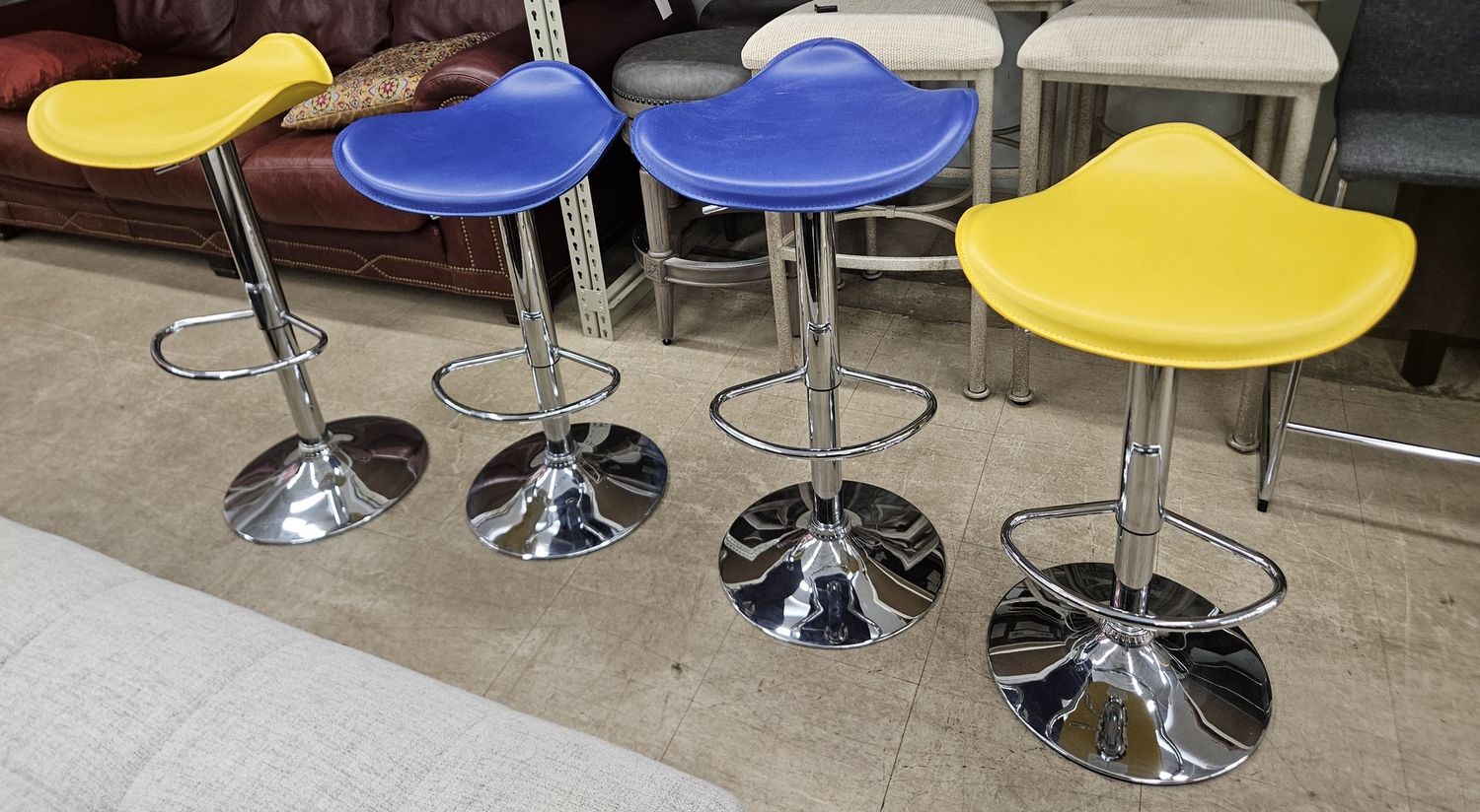 Vibrant set of four adjustable barstools