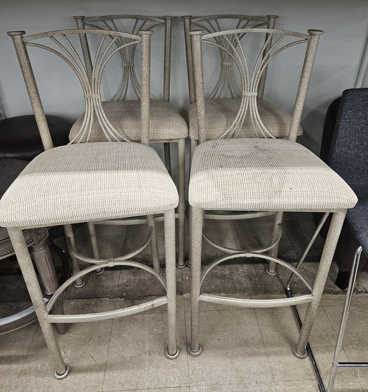 Set of four metal-frame barstools