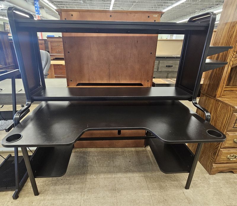 Modern black gaming or workstation desk